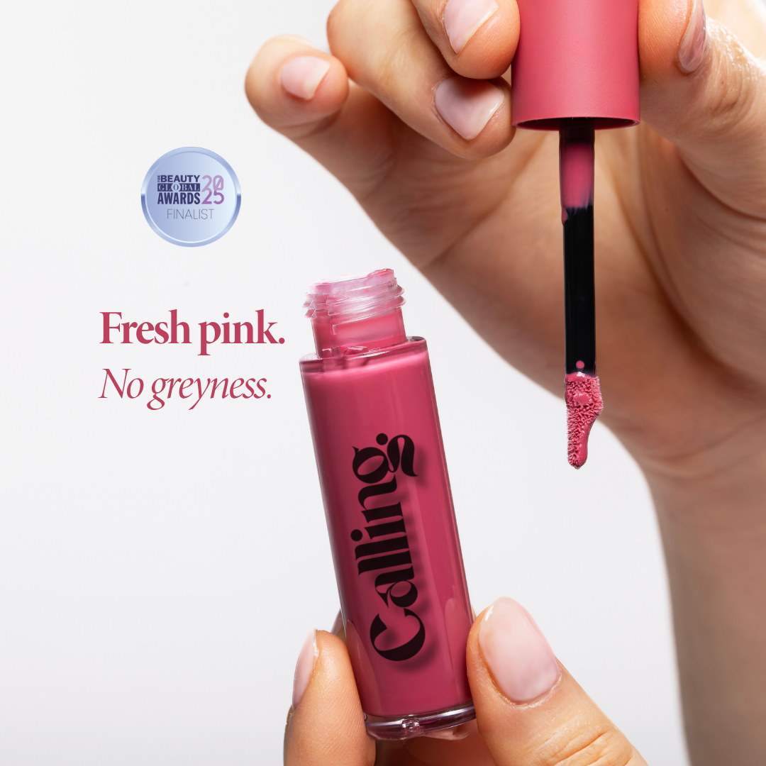 Mega Bite Tinted Jelly Lip Oil in Macaron, a sugary pink, with applicator. Pure Beauty Global Awards 2025 finalist