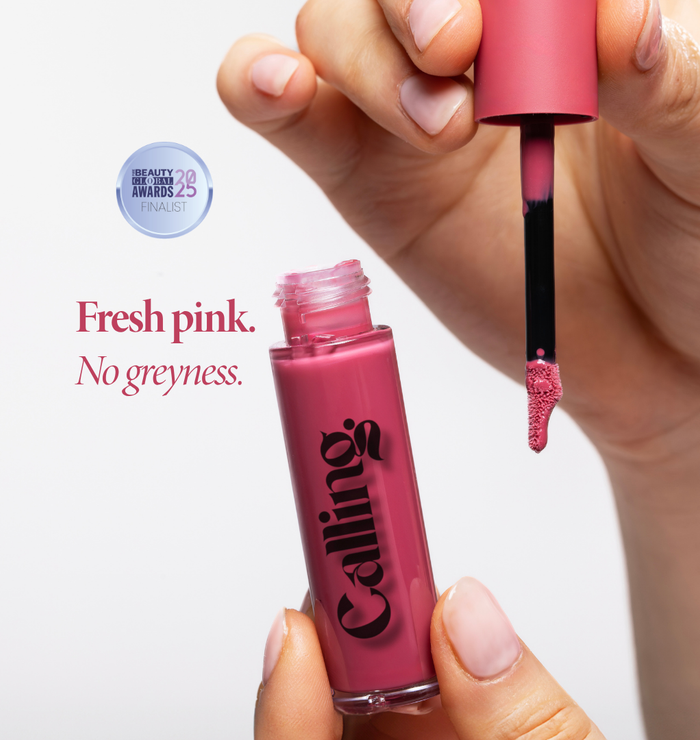 Mega Bite Tinted Jelly Lip Oil in Macaron, a sugary pink, with applicator. Pure Beauty Global Awards 2025 finalist