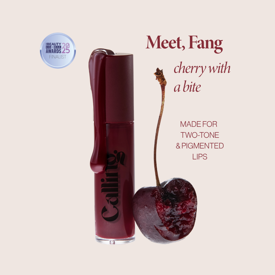 Mega Bite Tinted Jelly Lip Oil in Fang, a deep cherry red, with applicator. Pure Beauty Global Awards 2025 finalist